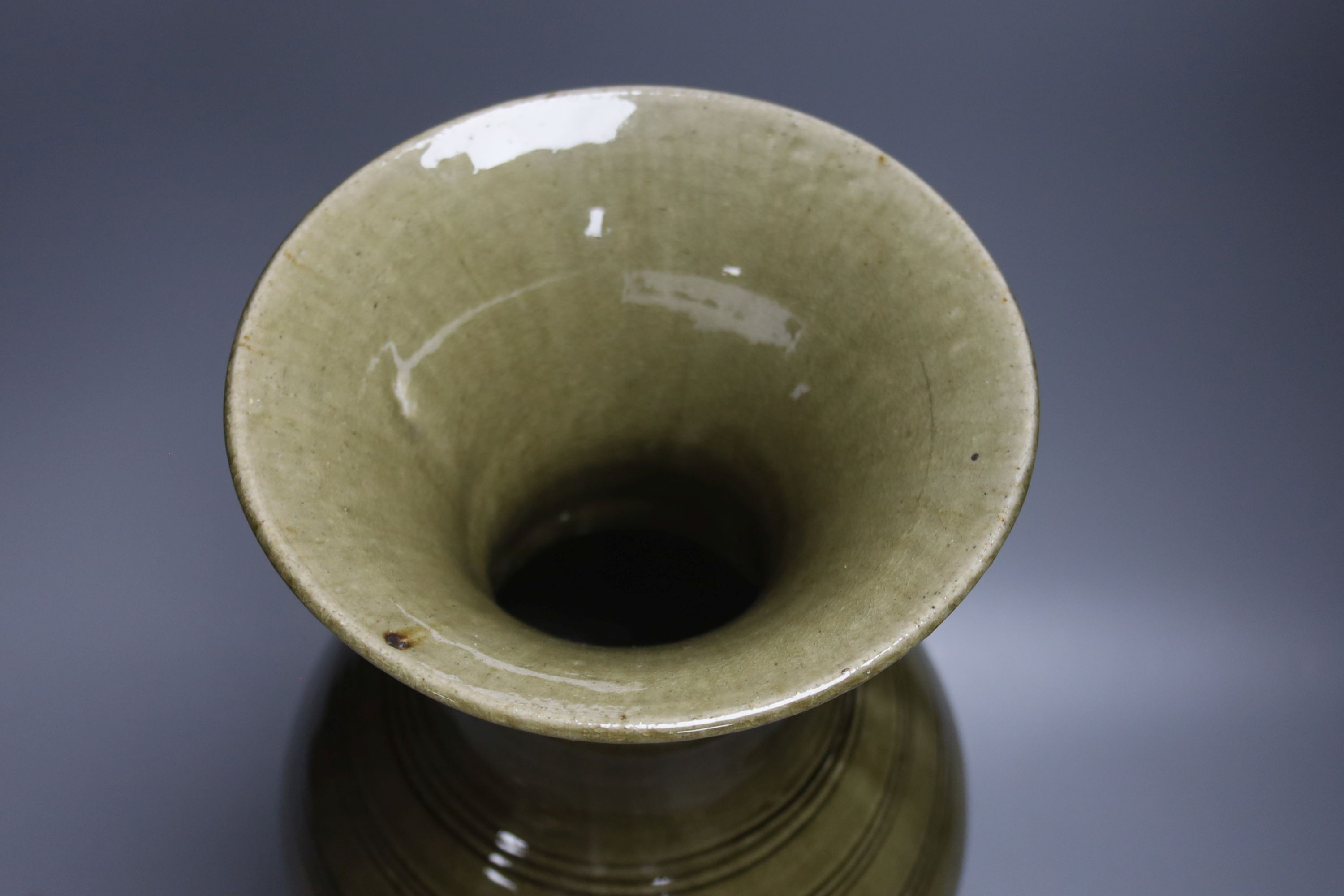 A large Chinese olive green glazed stoneware vase 40cm